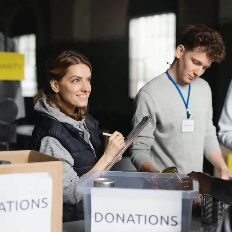 Rotary members helping with community donations